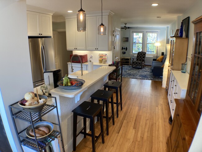 Dining room looking toward living room (main level). - 526 24th St NE