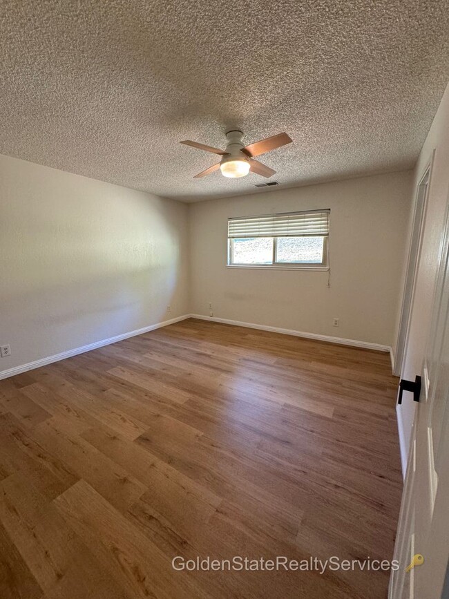 Building Photo - Vacation where you live! Single story home...
