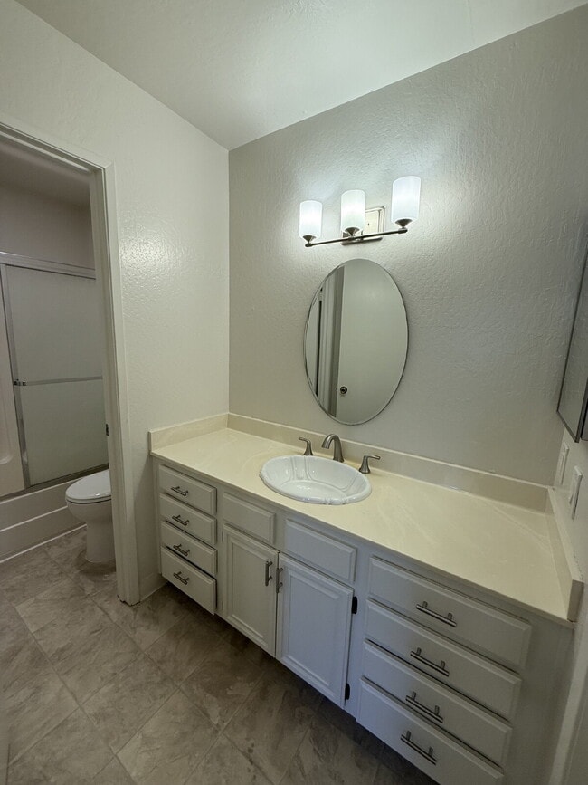 Building Photo - Spacious 3-Bedroom, 2-Bath Multi-Level Home with Balcony, In-Unit Laundry & Dual Parking