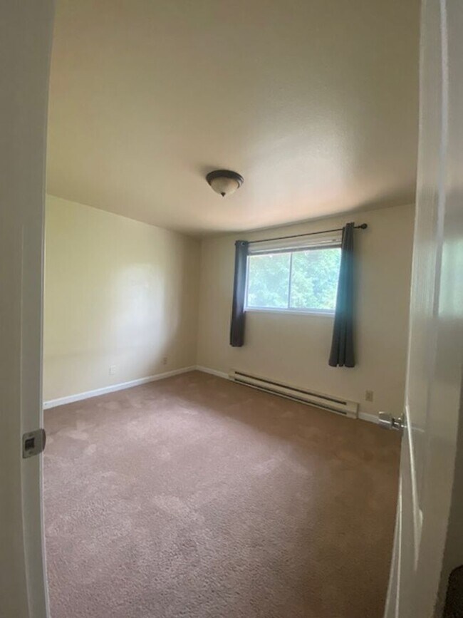 Building Photo - Recently Remodeled Two Bedroom Apartment With Canal Views and Private Balcony!