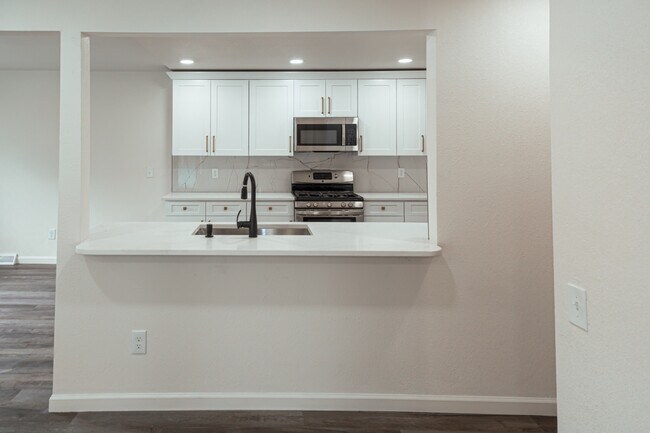 Building Photo - 7355 S Garfield Ct