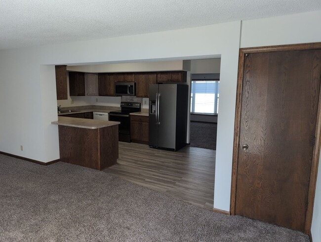Building Photo - Fully Updated 3 Bedroom 3 Bath Townhouse with 2 Stall Attatched Garage