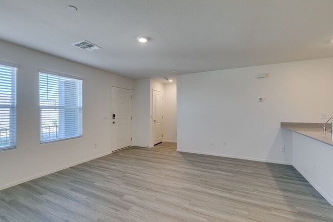 Building Photo - Gorgeous Townhome with upgrades in gated community* 3 large bedrooms, 2 car garage*Community pool...