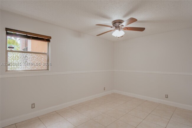 Building Photo - 2700 Coral Springs Dr