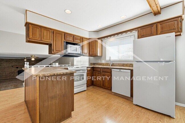 Building Photo - Spacious Home with 2 Car Garage and Fenced in Backyard!