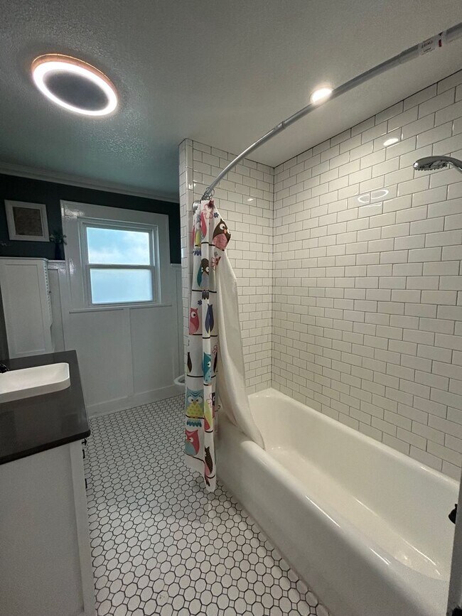 Building Photo - Spacious Corner Lot Charm