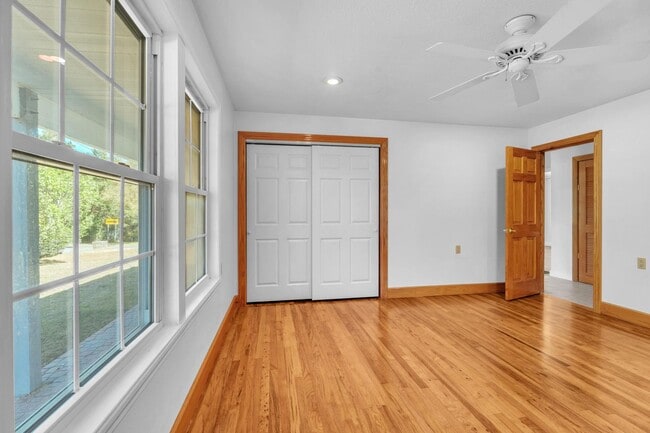 Building Photo - Charming home with large garage & attached...