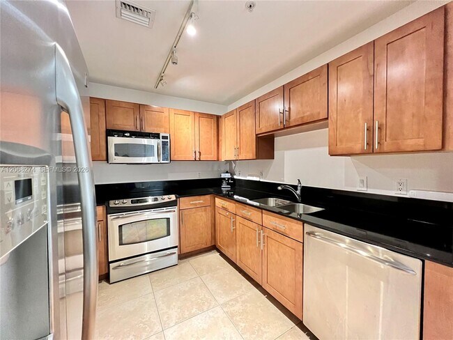 Building Photo - 8390 SW 72nd Ave