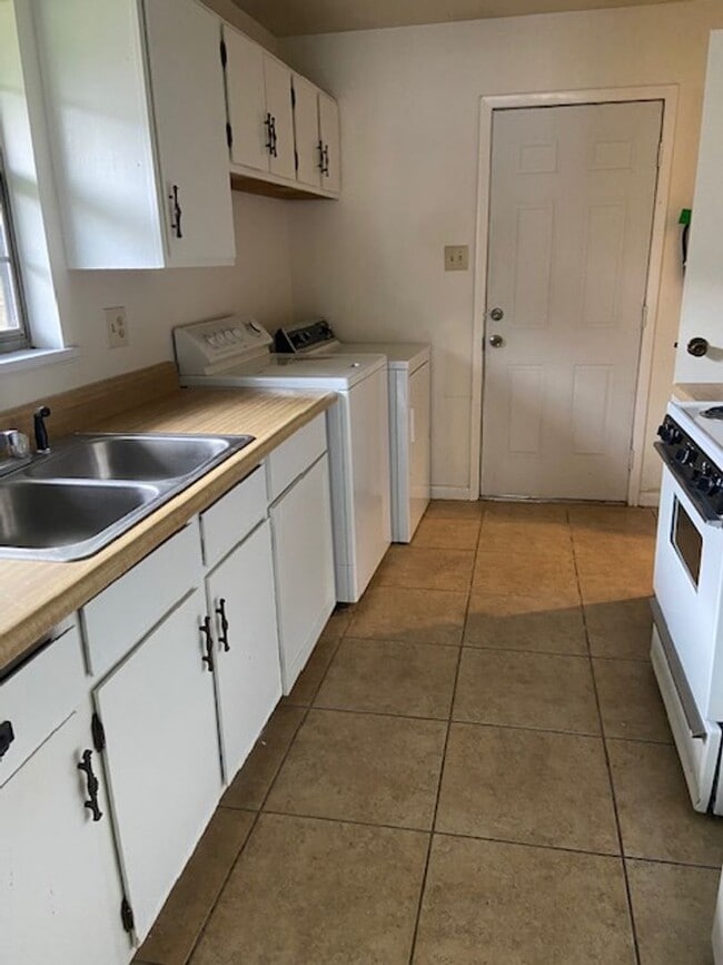 Building Photo - Nature in the Heart of the City: Live Near Moncus Park-2 BED 1 BATH