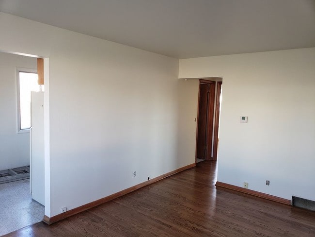 Building Photo - 2025 W Warnimont Avenue - 2 Bedroom Lower