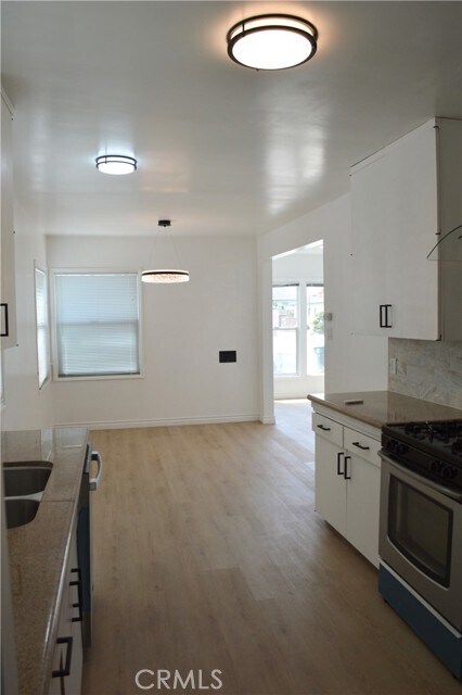 Building Photo - 1303 W 146th St