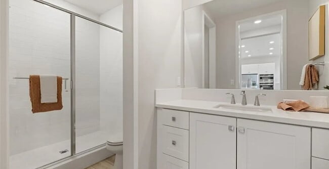 Building Photo - This single-level condominium on the 3rd f...