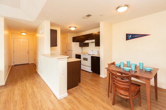 Apartment Entry and Shared Kitchen and Dining Area - University Crossing
