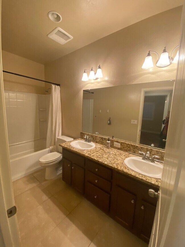 Building Photo - Move into Northwest Hanford and relax in your spa!