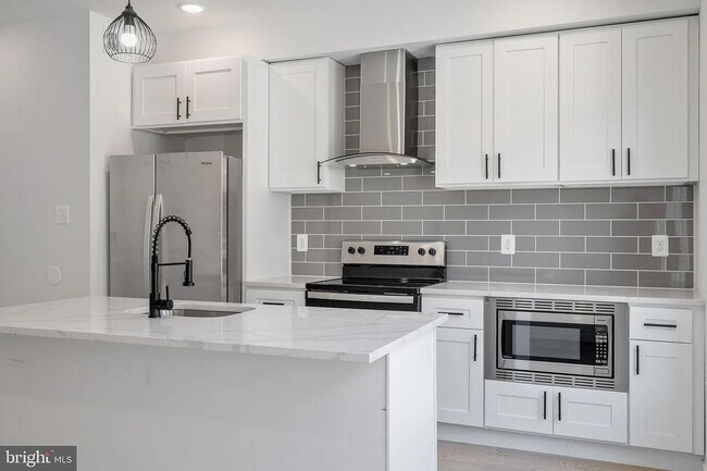 Building Photo - 5608 Florence Ave