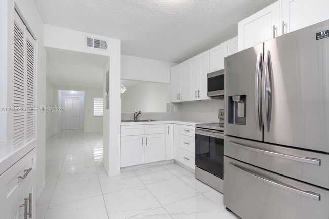 Building Photo - 6445 SW 130th Pl