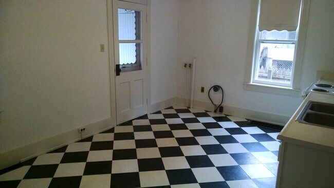 kitchen back door and washer/dryer hookups - 506 Brown St