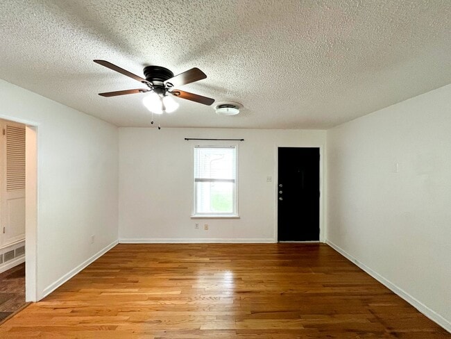Building Photo - Available Now!!!! Gorgeous 3 bedroom, 2 bath, 2 car garage home. Beautiful wood look flooring. Sp...