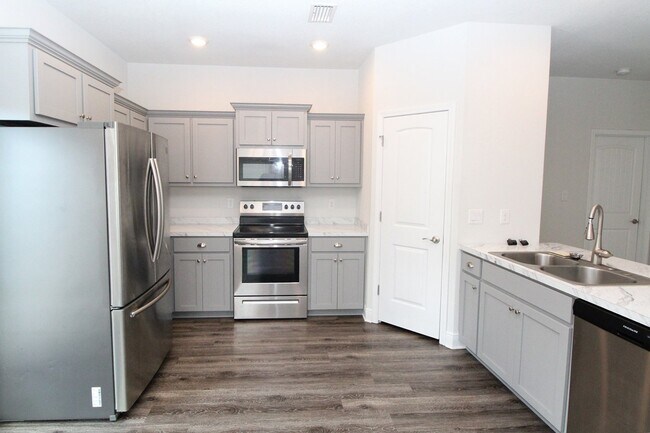 Building Photo - 4BR/2.5BA Home Near NAS Pensacola with First-Floor Primary, Stainless Kitchen & Covered Patio