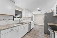 Building Photo - 6121 N Falkenburg Rd