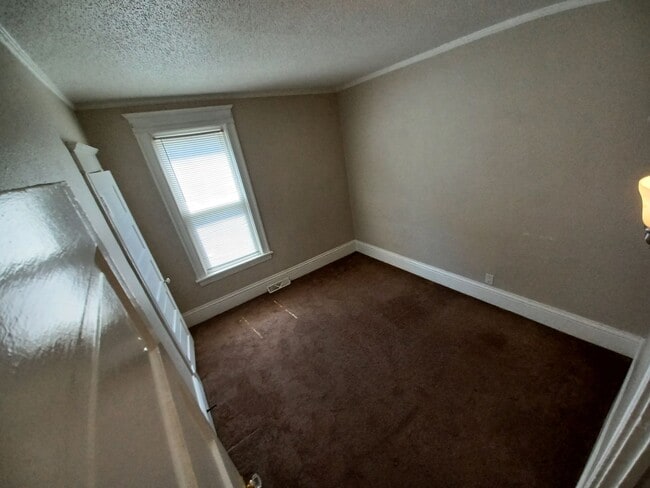 Building Photo - This spacious 3-bedroom lower level duplex...