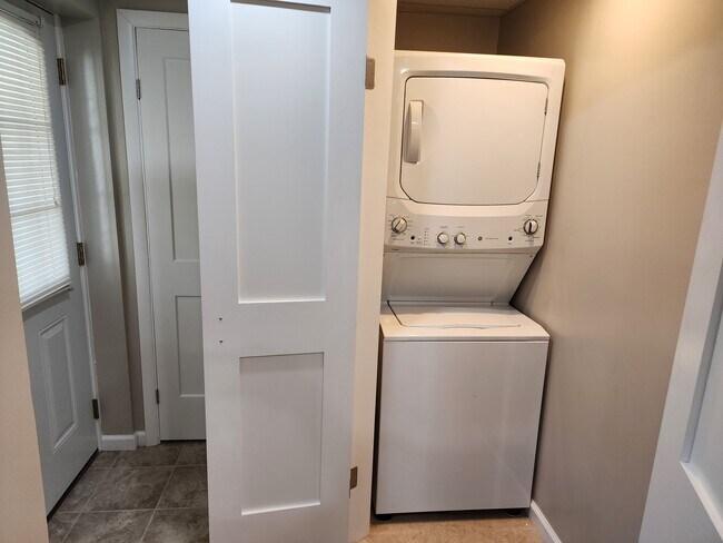 Laundry room with in-unit washer/dryer - 100 Manning Pl