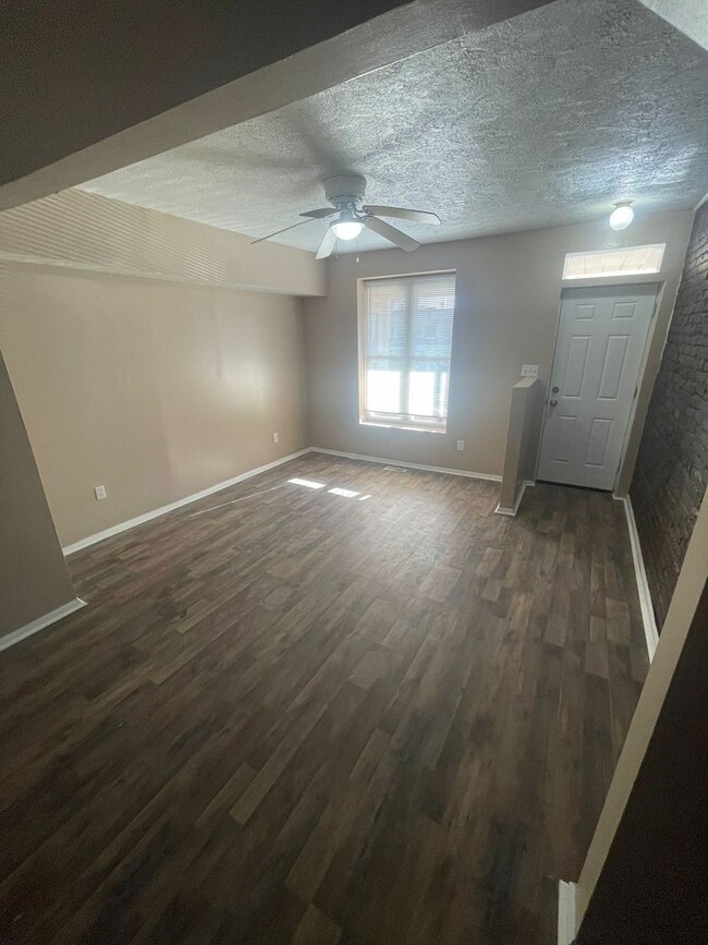 Building Photo - Two Bedrooms W/ Storage Room Upstairs 1 1/...