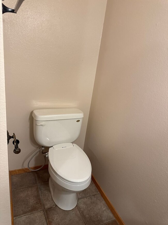 Building Photo - Two-story, four-bedroom, three-bathroom ho...