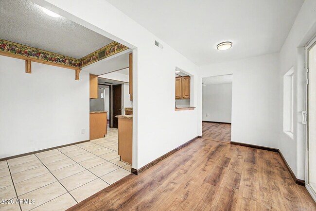 Building Photo - 9847 W Wrangler Dr