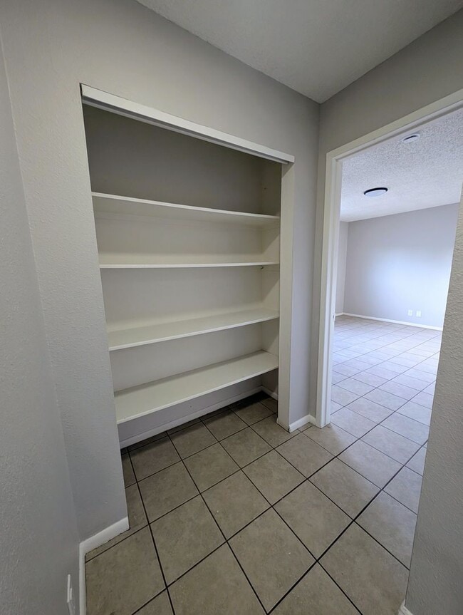 Building Photo - 4-bedroom house with a 2-car garage availa...