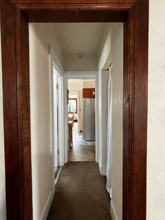 Hallway looking from central foyer towards kitchen/dining area - 2615 Parker St