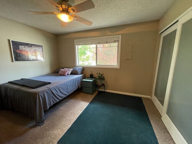 Building Photo - Stylish Corner Condo In Prime Location w/ Parking, Private Outdoor Space & W/D