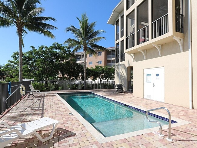Building Photo - BEAUTIFUL 3-BEDROOM  WATERFRONT CONDO WITH BOAT SLIP AND HEATED POOL