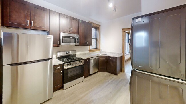 Building Photo - Lakeview Gem: 2 Bed, 1 Bath W/ In-Unit Laundry, D/W, Cent Air, Fireplace, Deck, Parking!