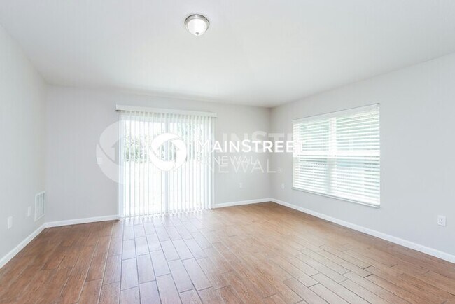 Building Photo - 4 Bedroom Pet-Friendly Home in PALM BAY, FL with Main Street Renewal