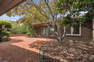 Building Photo - Modern Mid-Century 4 Bedroom, 3 Bath 2,200...