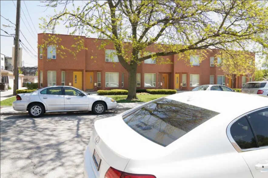 Across the Street - 6942 S Dante Ave