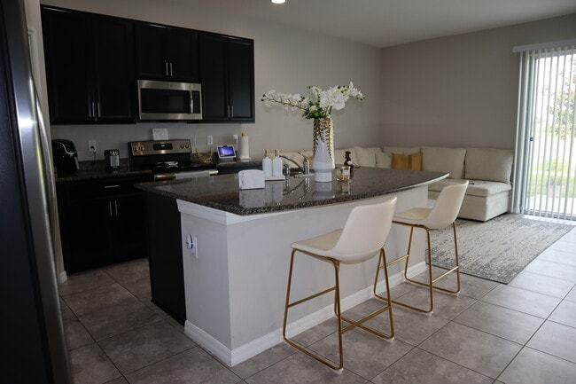 Building Photo - 7022 Grand Elm Dr