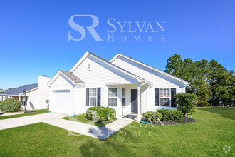 Building Photo - Welcome to this charming abode.