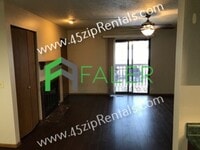 Building Photo - Spacious Ground Floor Condo with Patio
