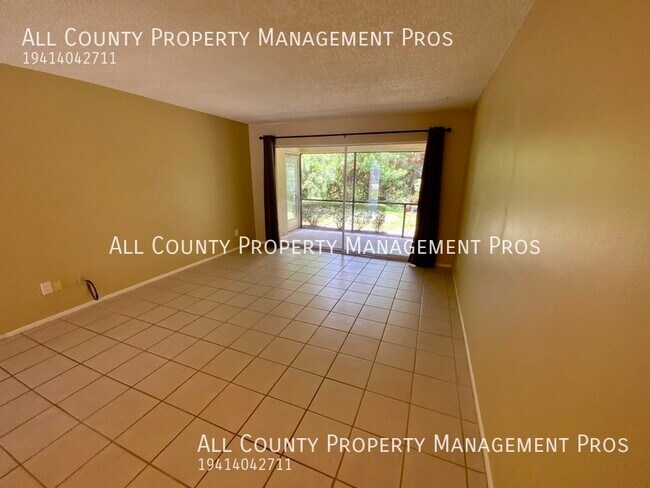 Building Photo - 7060 W Country Club Dr N