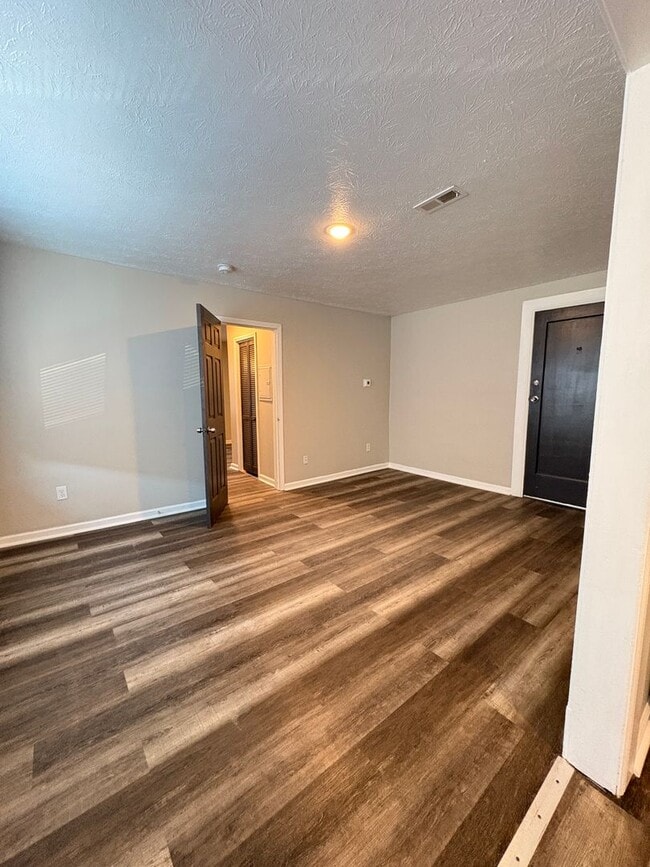 Building Photo - Live in Style without Breaking the Bank at Magnolias Living Apartments Washer & dryer in-unit