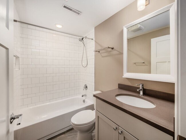 Building Photo - Luxury Living at Four X Five Condos