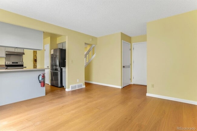 Building Photo - 8913 E Chenango Ave