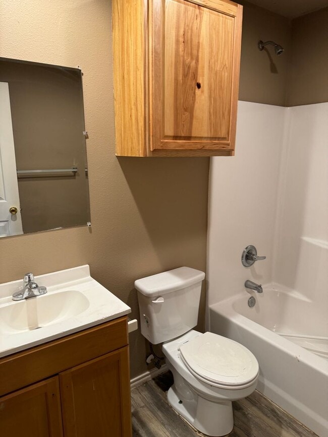 Building Photo - Fenced Backyard Garage *sec 8 approved*