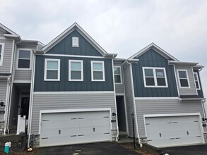 Building Photo - Luxury 4-Bedroom Townhome with Finished Walkout Basement & River Views