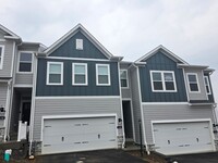 Building Photo - Luxury 4-Bedroom Townhome with Finished Walkout Basement & River Views