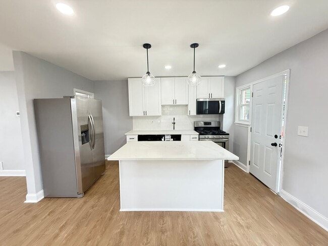 Building Photo - Four-Bedroom Home in Baltimore