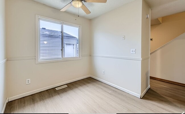Building Photo - Spacious 3 - Bedroom Townhome with Modern Updates & Private Green Space.