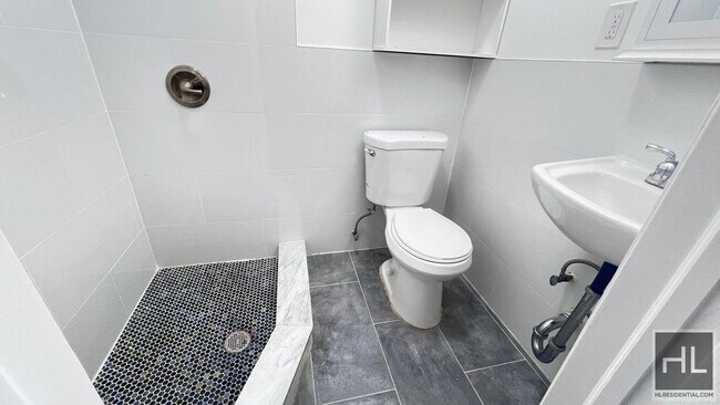 Building Photo - GUT RENOVATED VERY LARGE 3 BEDEROOMS W/ PR...